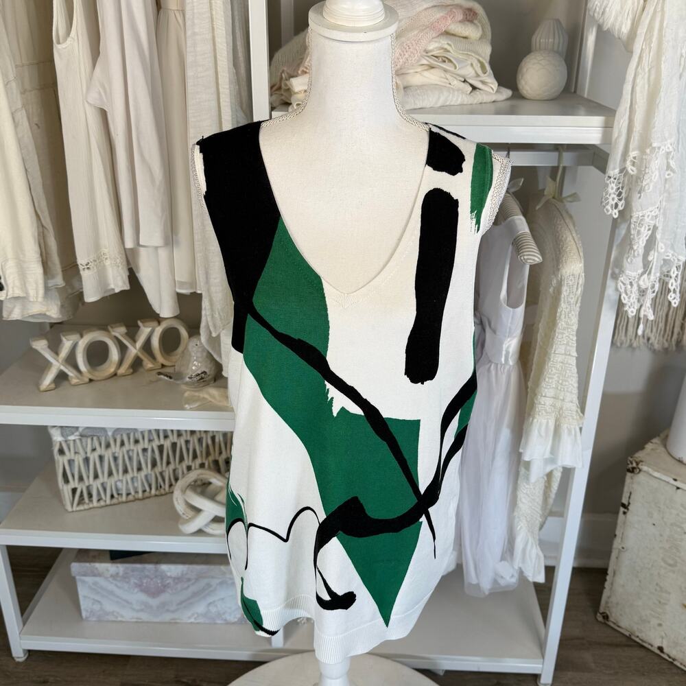 Chico’s sz. 1 (medium) graphic print light stretch knit tunic length vest 3934